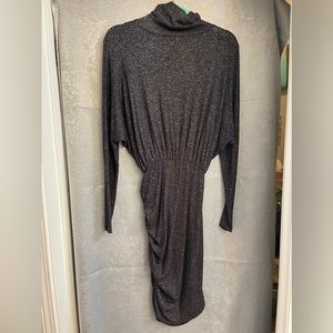 Women’s black turtleneck form fitting dress